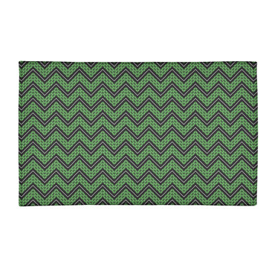 Tapis bleu/noir à chevron tiré à la main