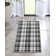 Tapis noir à tissage plat Kehr