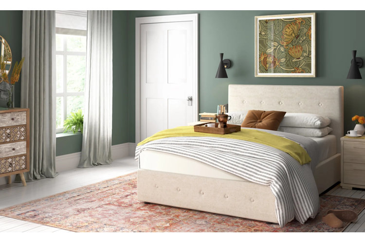 sage green bedroom with yellow bed runner