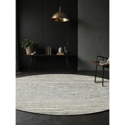 Tapis gris soyeux et moelleux