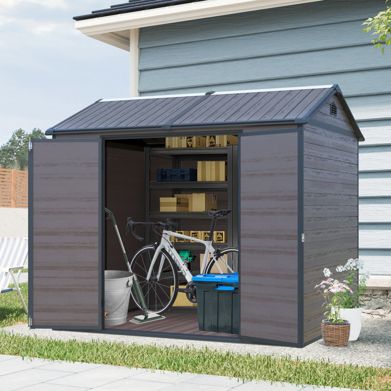 Remise imperméable 8 po x 6 pi en résine pour l'extérieur avec plancher et deux fenêtres et porte verrouillable