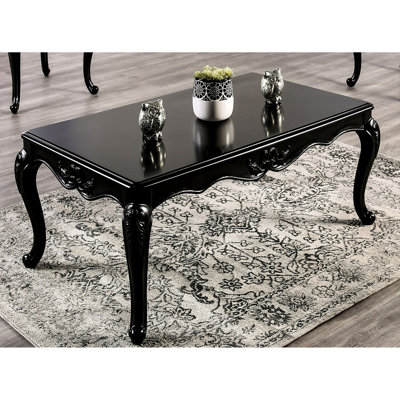 Et table basse traditionnelle à finition noire et noire avec pieds incurvés en bois massif, design, l 53 po x P 30,5 po H / H 20,5 po