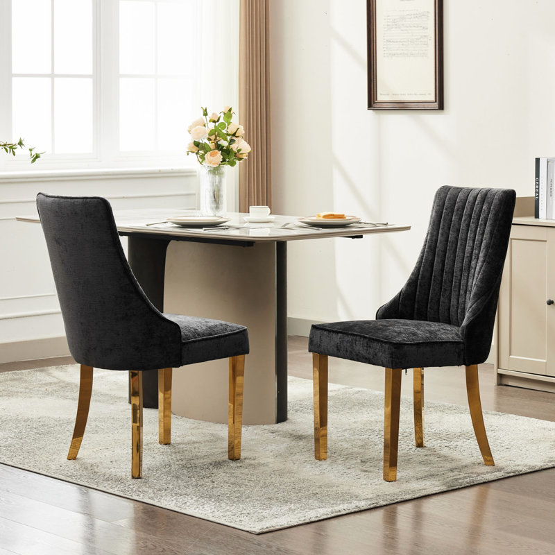 Chaises de salle à manger en rayonne recouvertes de tissu de rayonne avec dossier noir et 2 pattes plaquées en acier inoxydable doré pour un raffinement traditionnel et confortable
