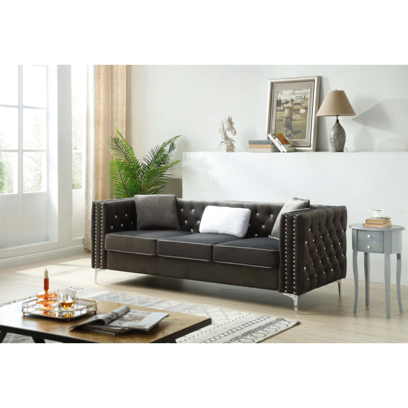 Le canapé Paige de Glory Furniture, un canapé rembourré avec un design moderne et une assise confortable pour des espaces de vie élégants