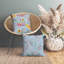 Coussin en faux suède coloré Flora-111762402