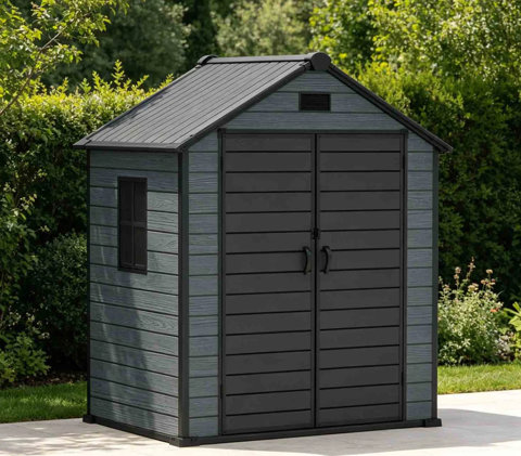 Outdoor storage shed with a grey wood-look exterior, black trim, double doors, and a side window set in a garden landscape.