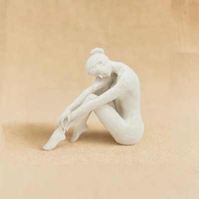 Sitting Woman Figurine