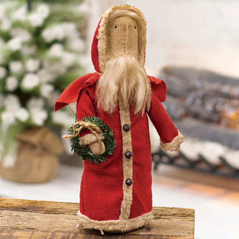 Père Noël assis avec une couronne