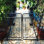 Metal Garden Arch With Gate 79.5'' Wide X 86.6'' High Climbing Plants Support Rose Arch Outdoor