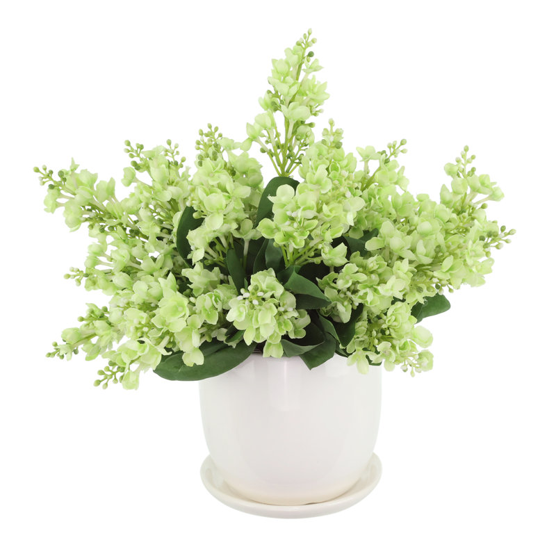 Lilacs Arranged in a Ceramic Pot