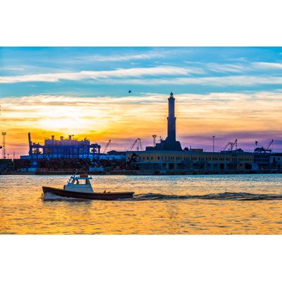 Sunset At Genoa's Port by Marcociannarel - Wrapped Canvas Print