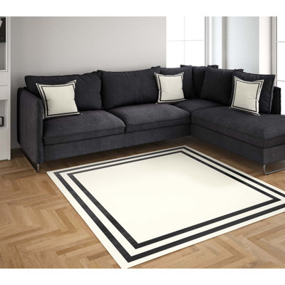 Tapis blanc / noir tissé à la machine Ashunti