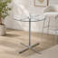 Table de bar ronde en verre avec base chromée pour petits espaces