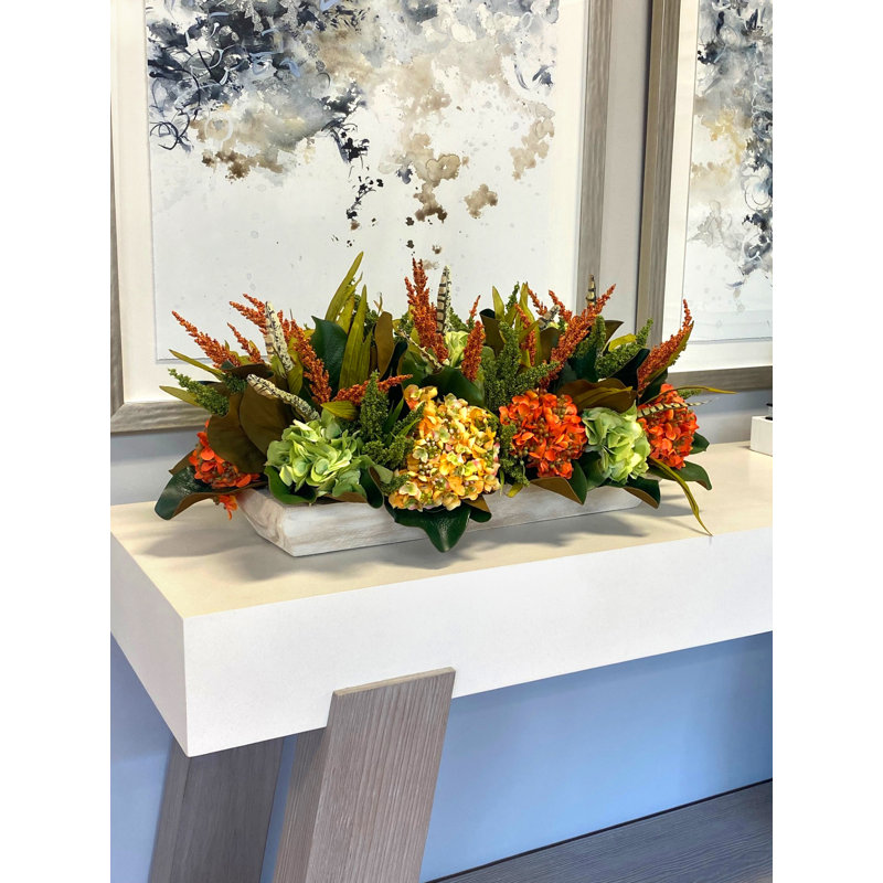 Arrangement floral d'hortensias dans un bol Horace