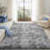 Light gray shag area rug