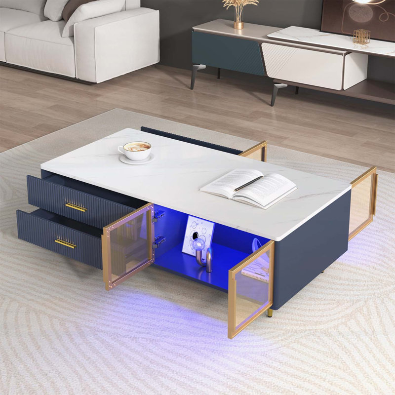 Table basse moderne bleu marine avec éclairage multicolore et beaucoup de rangement, parfaite pour les salons élégants