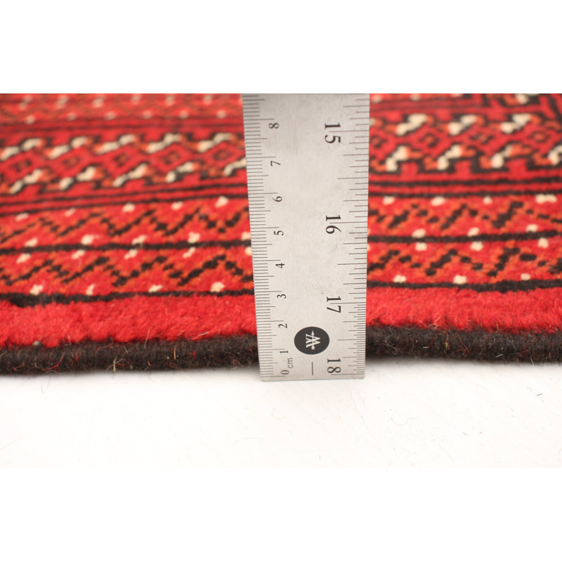 Tapis rouge / beige en laine noué à la main