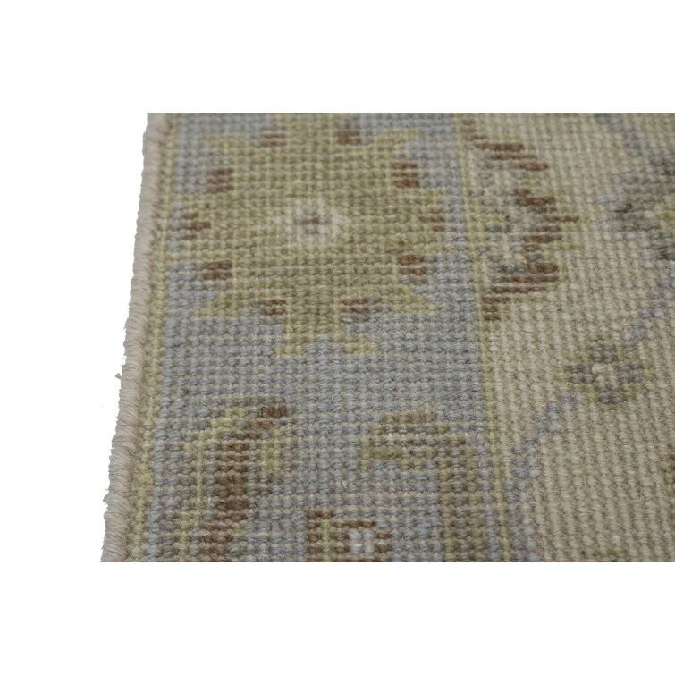 https://assets.wfcdn.com/im/80963642/resize-h755-w755%5Ecompr-r85/1634/163408483/Handmade+Hand-Knotted+Wool+Beige+Rug.jpg