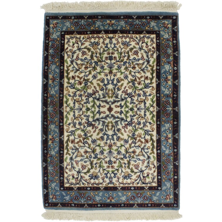 https://assets.wfcdn.com/im/80964224/resize-h755-w755%5Ecompr-r85/1836/183677254/Handmade+Hand-Knotted+Wool+Cream+Rug.jpg