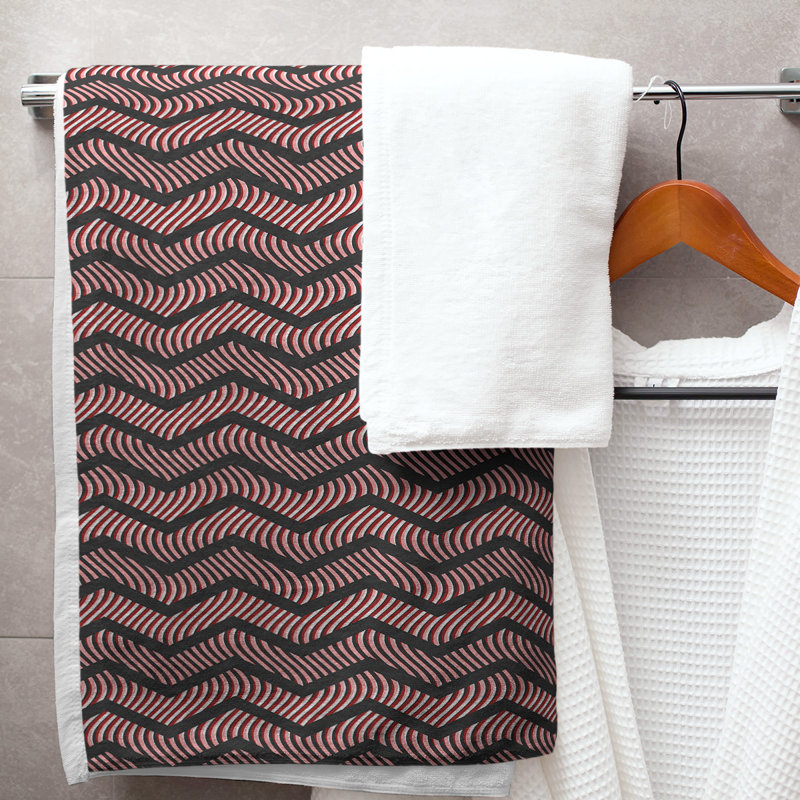Serviette de bain à chevrons ondulés Stephenie, Noir / Rouge