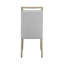 Ensemble de salle à manger moderne de 7 pièces comprenant une table rectangulaire en marbre blanc et des chaises élégantes et finement rembourrées.