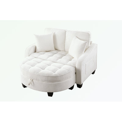 Double sofa chaise longue with irregular armrests and two small throw pillows