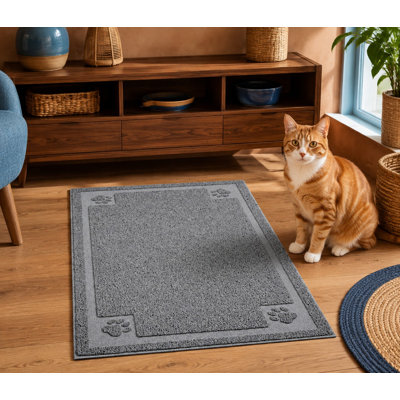 Ce grand bac à litière gris de 35 x 23 pouces est pliable, imperméable et antidérapant, avec une conception antidérapante adaptée aux bacs à litière et aux pattes sensibles, ainsi qu'une surface de piégeage facile à nettoyer.