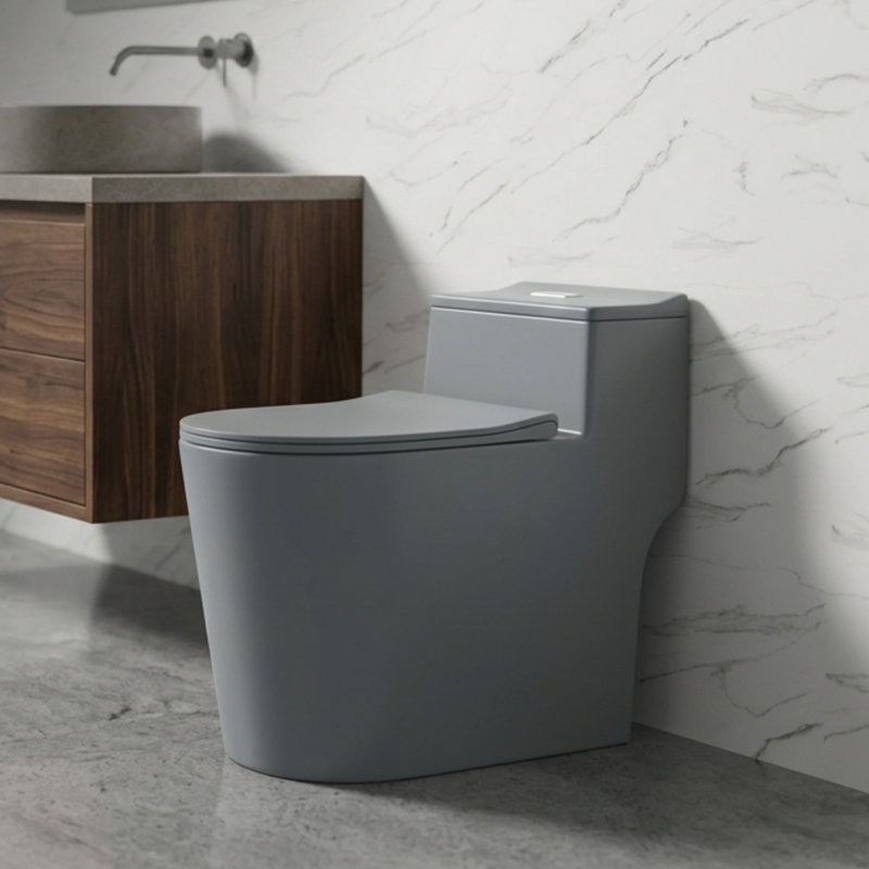 Elongated One Piece Toilet with Button Dual Flush, 1.28 GPF Average, 17.25" ADA Comfort Height, 12" Rough-In, Skirted Design, Soft Closing Quick-Release Seat
