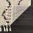 Adeeva Shaggy Performance Tasseled Cream/Black Area Rug-576438291