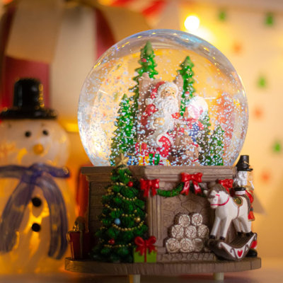 Boule à neige de Noël Père Noël et arbre de Noël changeant de couleur éclairée