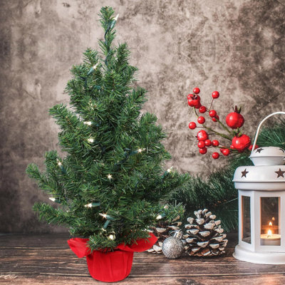 Ensemble de 12 sapins de Noël 2 pi avec base en tissu rouge