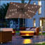 Parasol sophistiqué solaire de 9 pi x 7 pi, parasol de patio éclairé à DEL pour table ou base avec inclinaison et manivelle, parasol d'extérieur pour jardin, terrasse, cour, piscine, plage, brun