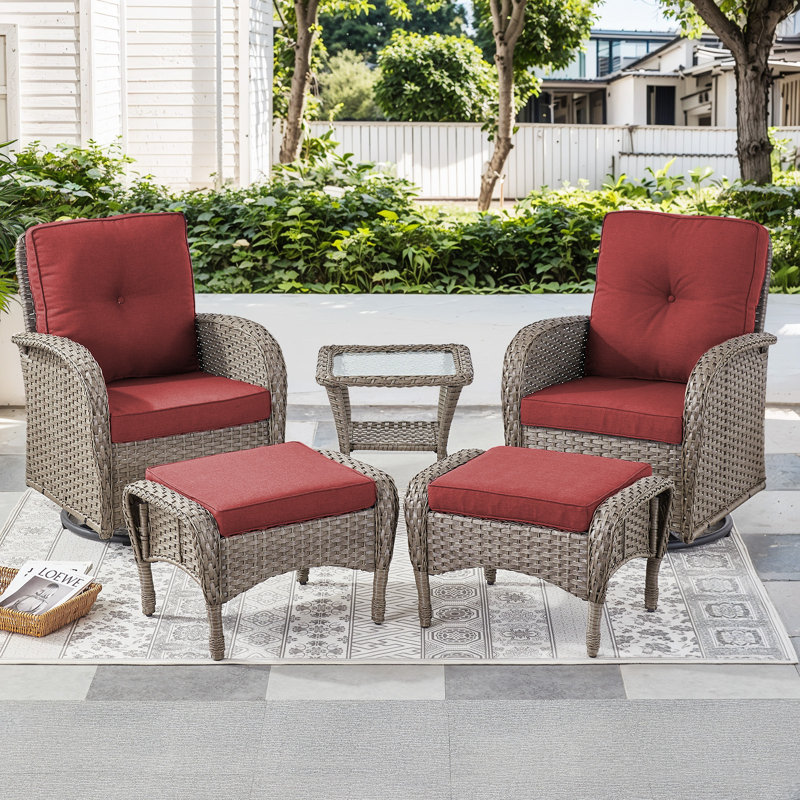 Fauteuil coulissant en osier pivotant avec repose-pieds et coussins avec table d'appoint Keywest, Rouge