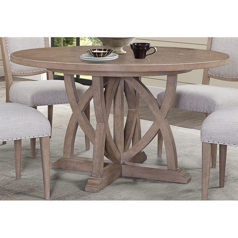 Table de salle à manger ronde polyvalente et extensible pour diverses occasions, idéale pour accueillir des réunions et des repas de famille avec un support robuste