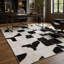 Tapis en cuir de vache noir et blanc fabriqué à la main, tapis en cuir géométrique-725716321
