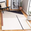 Tapis en laine touffeté à la main Delahni-110755664