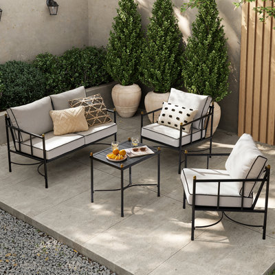 Eleena Steel Patio Dining Set Rectangular Table with Cushions Included