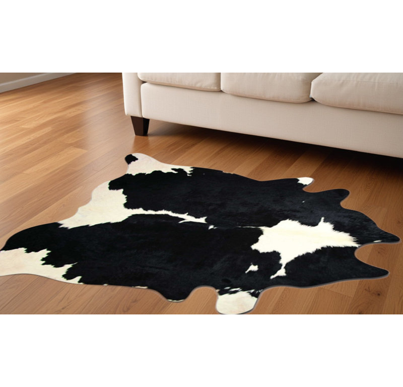Tapis noir et blanc 5 pi x 7 pi en peau de vache