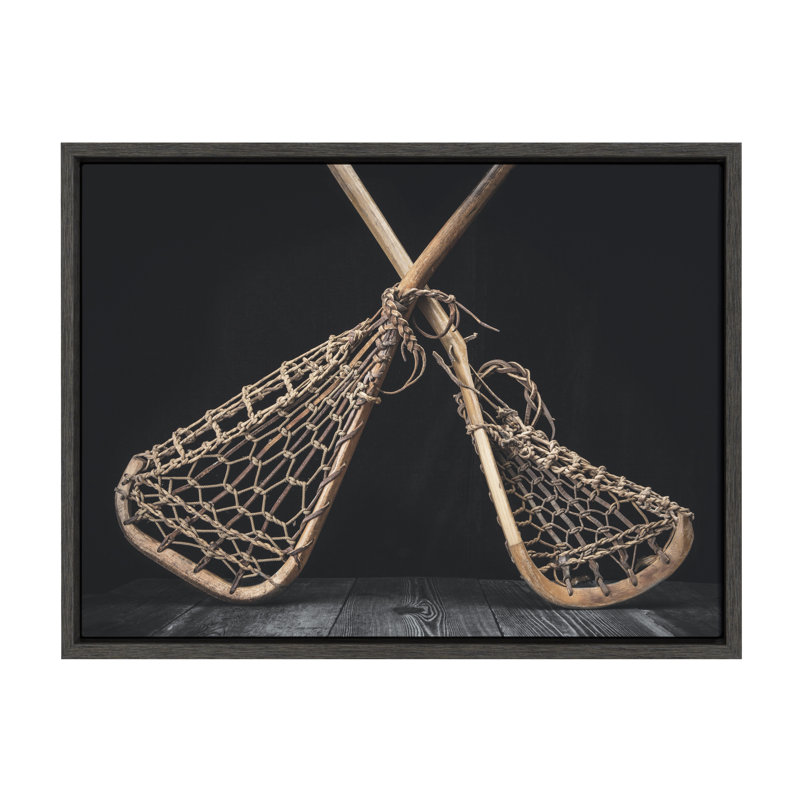 «Vintage Lacrosse Sticks on Black» par Saint and Sailor Studios, reproduction d'art sur toile encadrée