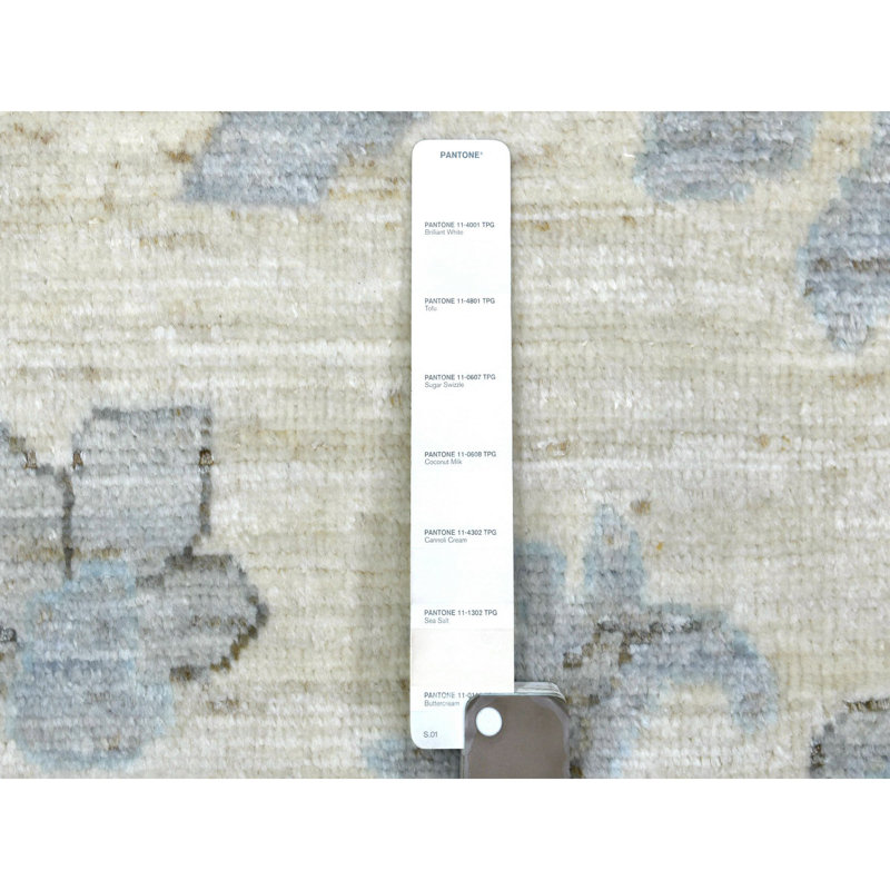 Tapis ivoire en laine noué à la main 8 pi x 9 pi 9 po B73E2CD901E54FEE849AD39CCD90B1C1