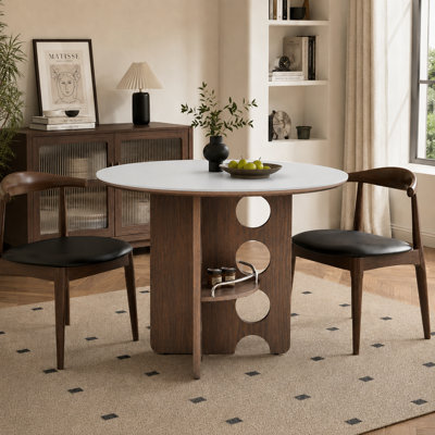 Table de salle à manger ronde de 89 cm (35 po) pour 2 à 4 personnes, plateau en pierre frittée noire, tablette de rangement en MDF de couleur noyer et pied central.