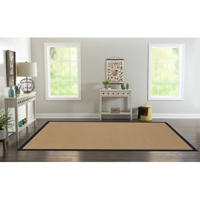 Tapis berbère beige foncé avec bordure en coton noir fait à la main Nannette