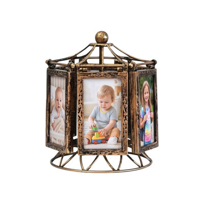 Cadre photo rotatif vintage en bronze antique, présentoir carrousel en métal avec volutes