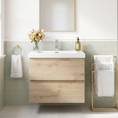 Meuble-lavabo mural de 61 cm (24 po) en panneaux de particules mélaminés (MFC) avec dessus en résine blanche brillante et carbonate de calcium, deux tiroirs coulissants en forme de U à fermeture douce, préassemblé