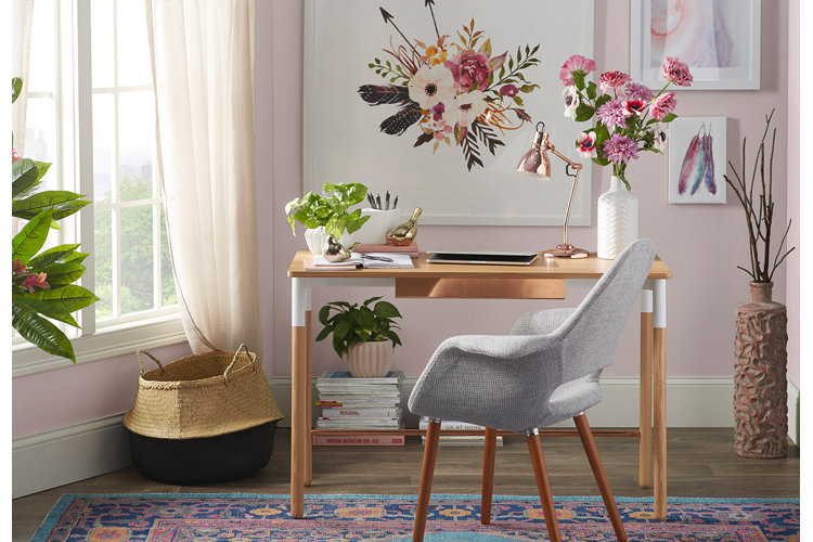 wooden desk with faux flowers