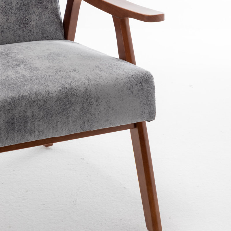 Chaise recouverte de velours avec une silhouette emblématique de style Mid-Century, structure en bois stable et revêtement doux