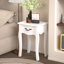 Table de rangement sur pied blanche avec tiroir et 4 pieds courbés