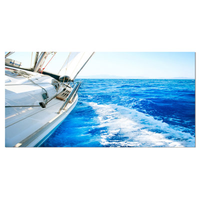 " White Sailing Yacht In Blue Sea "