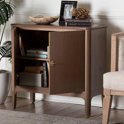 Armoire de rangement à 2 portes bali & pari Latifa avec bords arrondis et poignées de porte en métal pour le salon ou le vestibule
