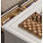 Four-drawer coffee table in solid white wood.-110956625